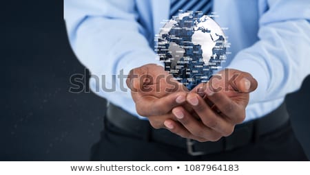 Stock fotó: Hand Holding A Globe With Connectors