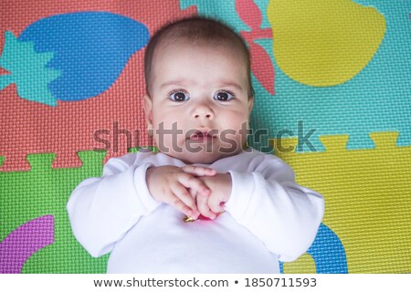 Stock foto: Sweet Indian Baby Playing On Floor