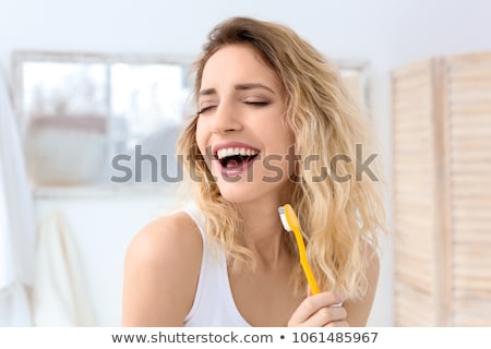 [[stock_photo]]: Portrait Of A Young Woman In Bathroom