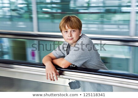 [[stock_photo]]: Boy On A Moving Staircase