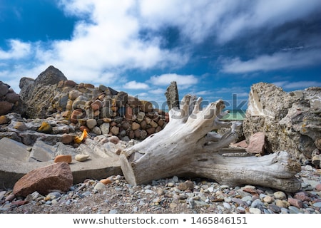 Stock photo: Landscape Format Wide Angle Pebble Beach And Blue Sky