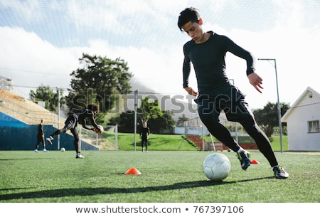 Stock photo: Man Dribbles