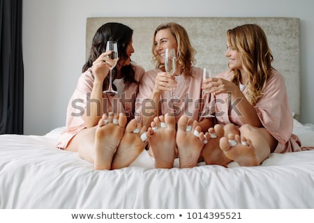 Stok fotoğraf: Bride To Be And Bridemaids Holding Glass With Champagne