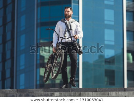 Stock fotó: Businessman Walking With Bicycle