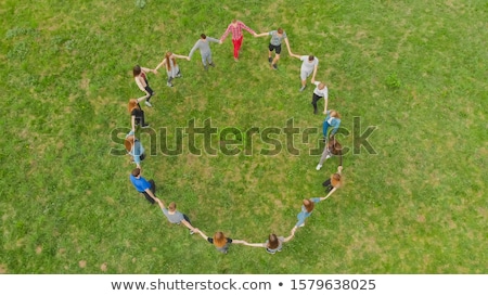 Foto stock: Man And Woman Dancing Latin American In Park