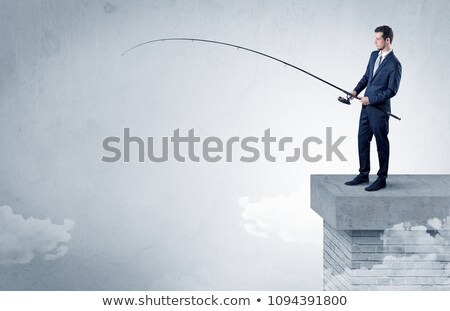 Stock fotó: Businessman Fishing Nothing From The Top