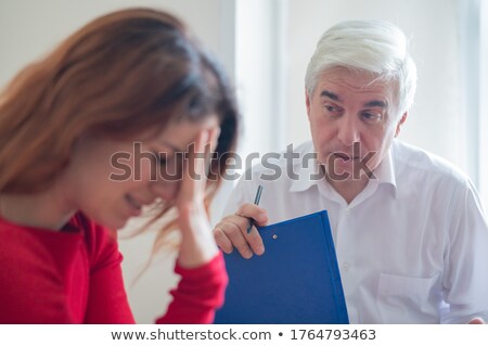 Foto stock: Senior Woman Psychologist And Crying Man Patient