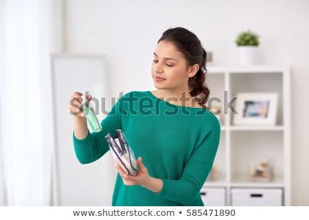 Сток-фото: Woman Packing Toiletries