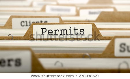 Stok fotoğraf: Permits Concept With Word On Folder