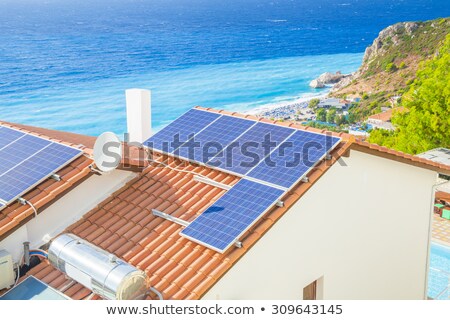 ストックフォト: Blue Solar Panels On Roof At Sea