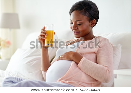 Stockfoto: Ooie · zwangere · vrouw · die · sinaasappelsap · drinkt