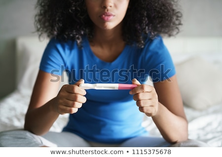 Foto stock: Young Woman In Desperation About The Result Of Her Pregnancy Tes