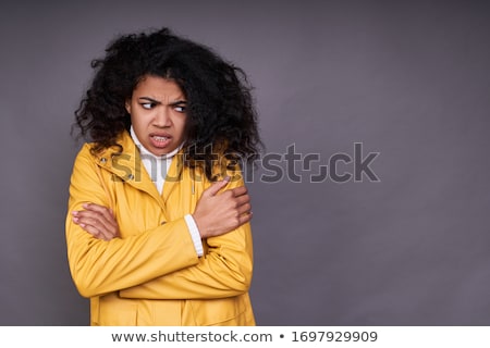 Zdjęcia stock: Frozen Young Girl Wearing Raincoat Standing