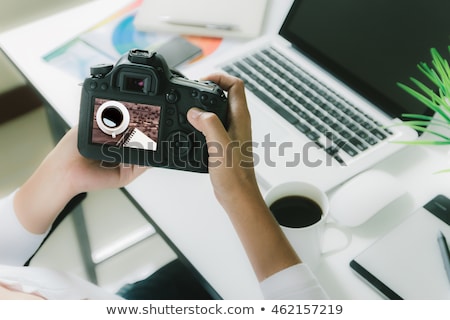 Stock fotó: Female Editor Holding Dslr Camera