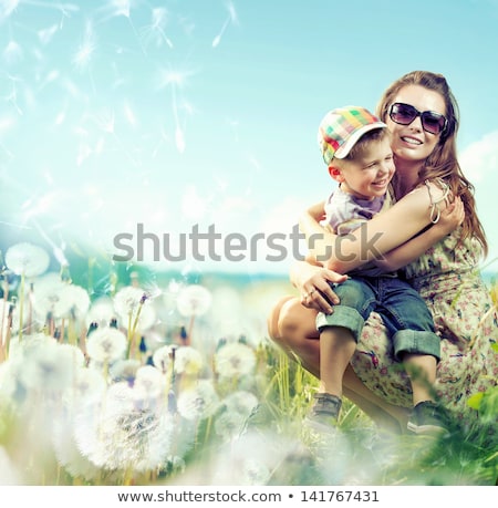 ストックフォト: Portrait Of Happy Mother And Two Son In Park