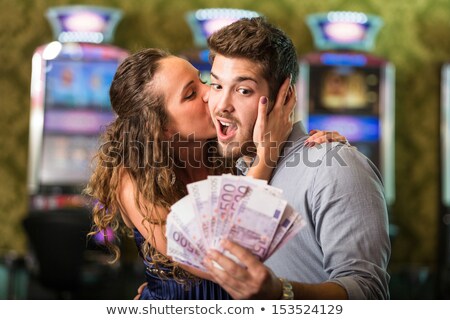 Stok fotoğraf: Machine For Winning Money Happy Gambler Woman