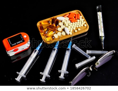 Stock photo: Natural Medicine In Black Mirror Background