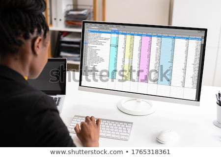 Stock photo: African American Auditor Using Electronic Spreadsheet