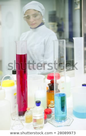 Stock photo: Woman Working Laboratory Glass Cylinder Vase