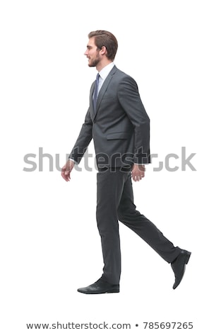 Stok fotoğraf: Young Handsome Business Man Walking