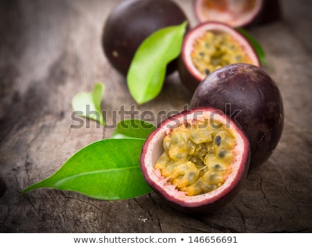 Stok fotoğraf: Passion Fruits On Wooden Background