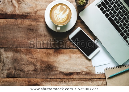 Stockfoto: Desk With Laptop Coffee And Notepad