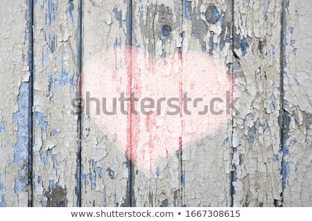 Foto stock: Abstract Heart With Messy Pattern On Old Wooden Wall