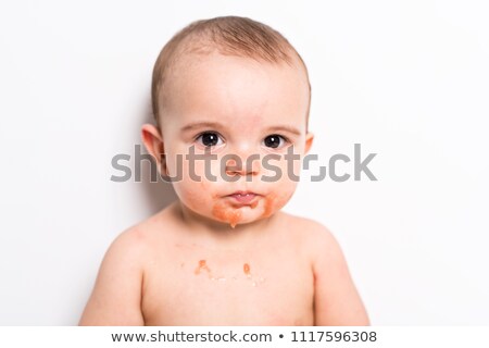 [[stock_photo]]: Happy Infant Baby Boy Doing A Mess Eating Puree