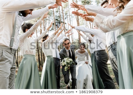 ストックフォト: Bride Dancing And Smiling Bridesmade Partying