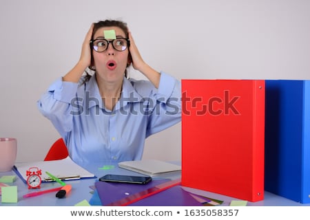 Stock photo: Surprised Woman With Note On Her Forehead
