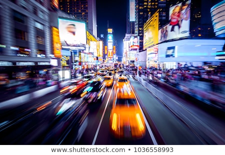 Zdjęcia stock: People Moving On A Square Motion Blur