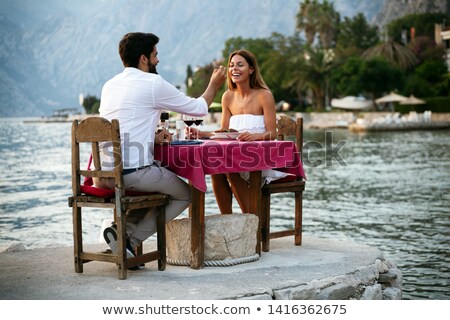 Сток-фото: Young Couple Enjoying Romantic Evening On The Beach