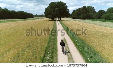 Stock fotó: Natural Young Cyclist With Amazing View