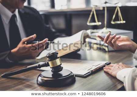 Stock photo: Justice And Law Conceptmale Judge In A Courtroom Working On Woo