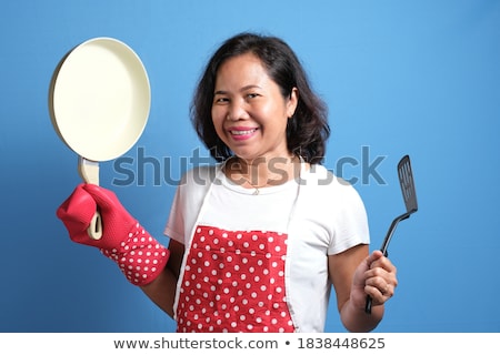 Imagine de stoc: Cheerful Chef Cook Wearing Uniform Showing Frying Pan