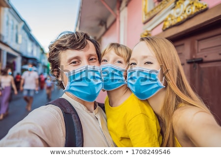ストックフォト: Mom And Son Are Tourists On The Street In The Portugese Style Romani In Phuket Town Also Called Chi