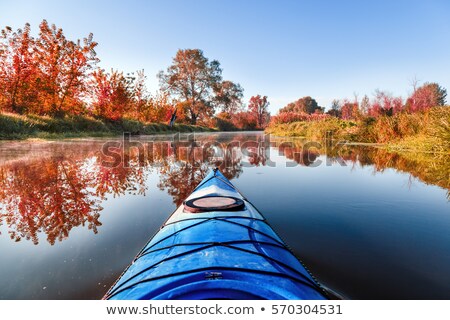 Stock photo: Paddle Boat Heading Down River