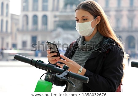 [[stock_photo]]: On Her Mobile