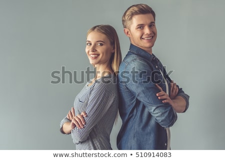 Stockfoto: Portrait If The Young Man And Two Pretty Women