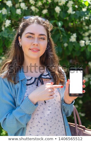 Stockfoto: Woman Holding Up Her Index Finger