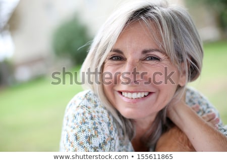 Stockfoto: Relaxed Attractive Mature Woman Portrait Outdoor