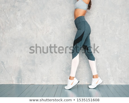 Foto stock: Woman Wearing Leggings Posing