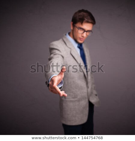 [[stock_photo]]: Young Man Standing And Throwing Something