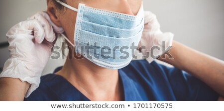 Foto stock: Doctor Wears A Glove