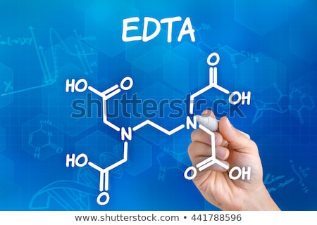 Foto stock: Hand With Pen Drawing The Chemical Formula Of Edta