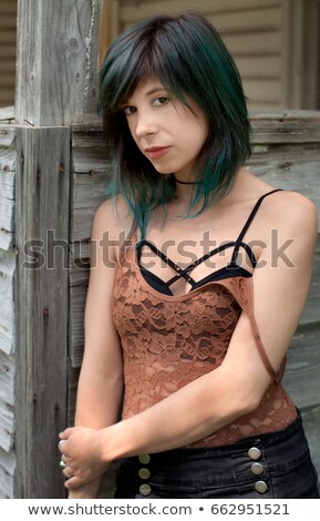 Stockfoto: Woman In Bralette Leaning On Wall