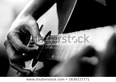 [[stock_photo]]: Close Up Of Hands Playing An Bass