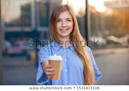 Foto stock: Young Woman Offering Drink