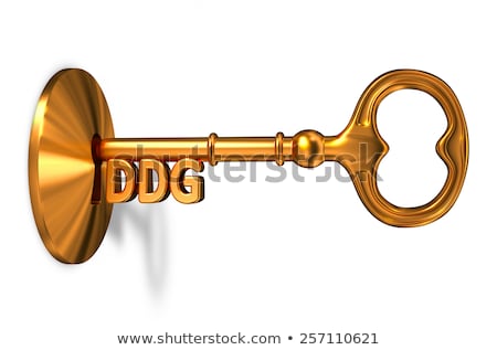 Zdjęcia stock: Ddg - Golden Key Is Inserted Into The Keyhole