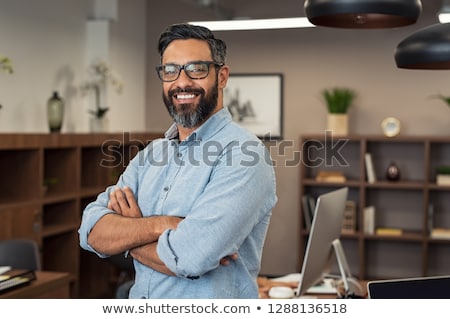 Stock foto: Portrait Of Happy Businessman Standing Arms Crossed